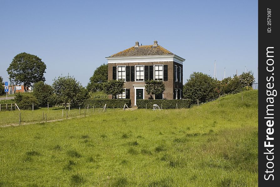 A classical 18th century house near the small town of Edam in the Netherlands. A classical 18th century house near the small town of Edam in the Netherlands