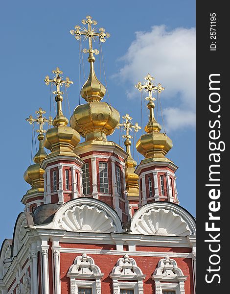 Gold domes on the blue sky in Moscow. Gold domes on the blue sky in Moscow