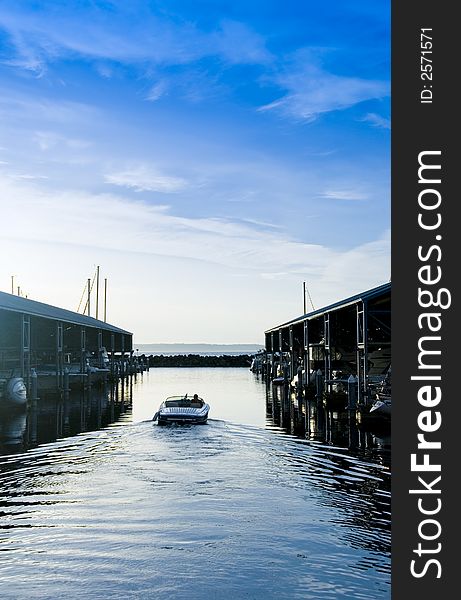 Ski boat leaving the Edmonds marina near Seattle, WA. Ski boat leaving the Edmonds marina near Seattle, WA