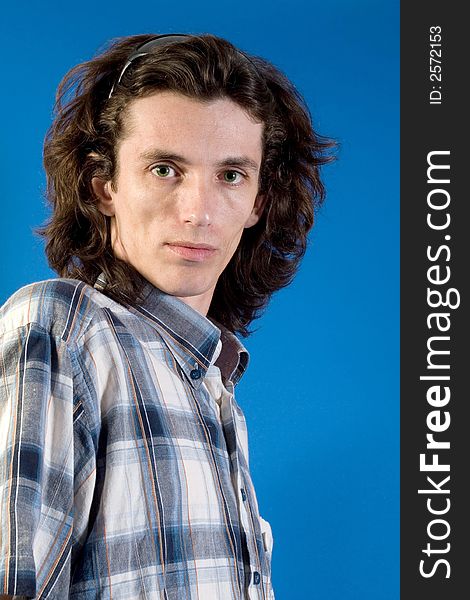 Young man portrait in blue sport shirt. Young man portrait in blue sport shirt