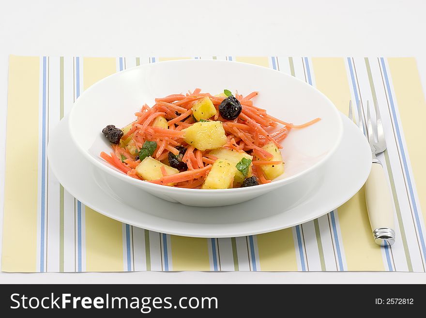 Shredded carrots, pineapple chunks, raisins mixed together for a refreshing salad or side dish. Shredded carrots, pineapple chunks, raisins mixed together for a refreshing salad or side dish.