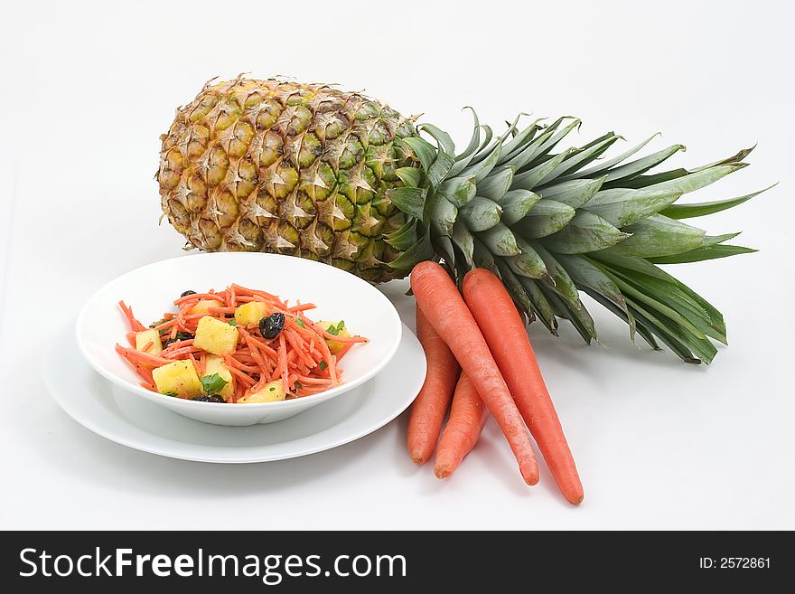 Shredded carrots, pineapple chunks, raisins mixed together for a refreshing salad or side dish. Shredded carrots, pineapple chunks, raisins mixed together for a refreshing salad or side dish.