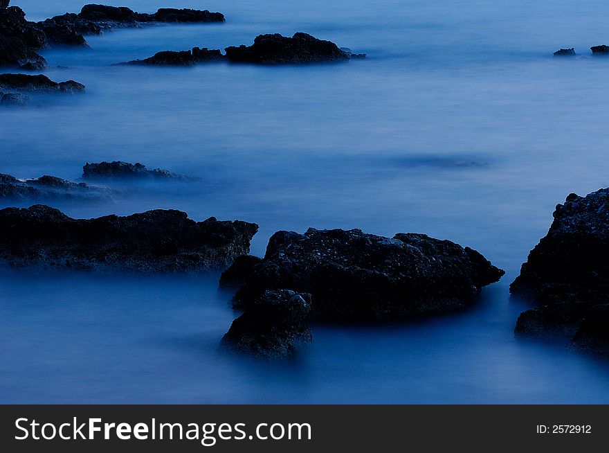 Picture of sea rocks at low light. Picture of sea rocks at low light