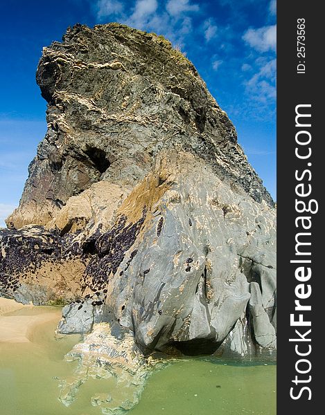 One of the rocks of bedruthin steps,
near newquay,
cornwall,
united kingdom. One of the rocks of bedruthin steps,
near newquay,
cornwall,
united kingdom.