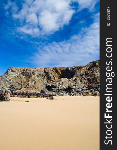 Sand,cliffs and clouds