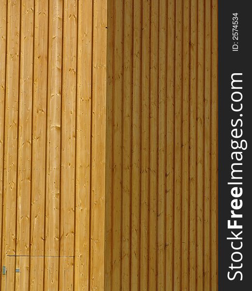 A detail view of a wooden barn. A detail view of a wooden barn.