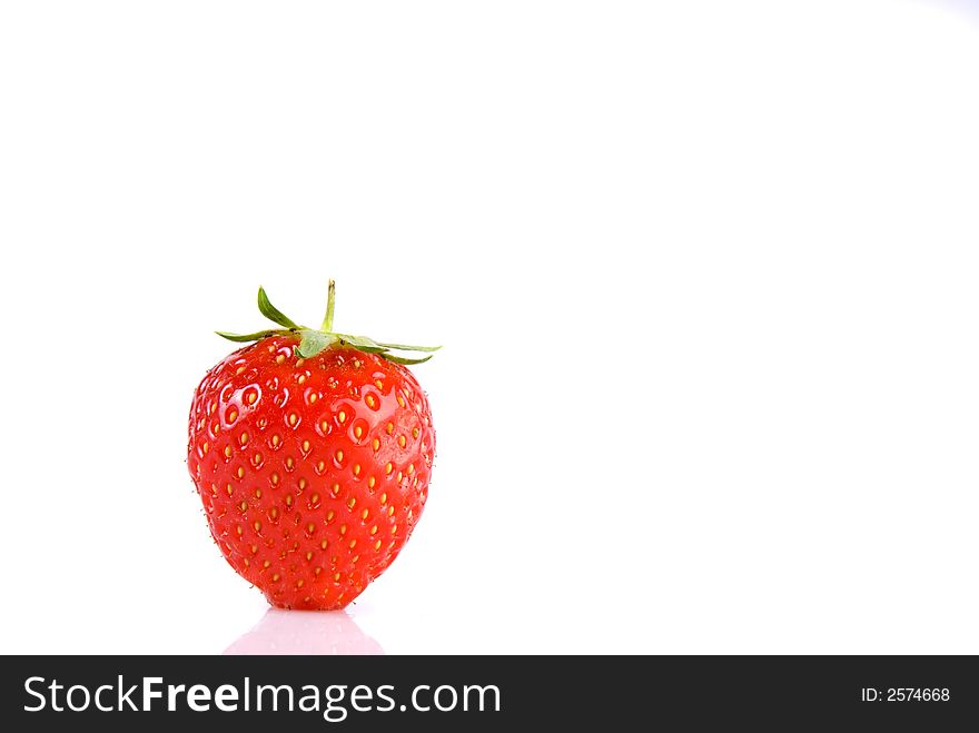 Strawberry isolated over white with reflection