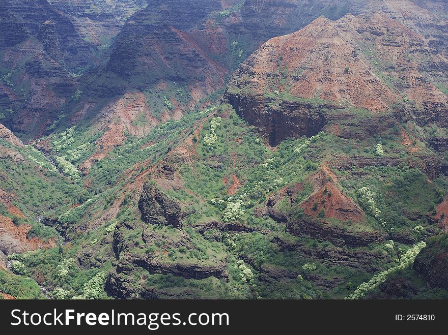 The view of colourful Waimea Canyon on Kauai island, Hawaii. The view of colourful Waimea Canyon on Kauai island, Hawaii.