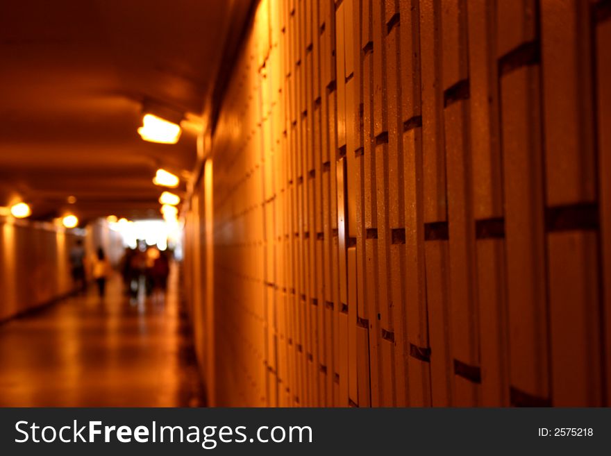 Underpass beneath a highway with halogen light