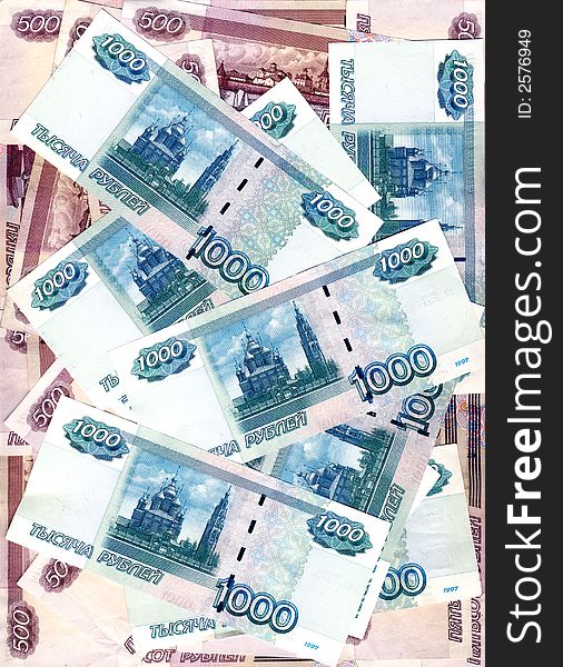 Some denominations of denomination in five hundred and one thousand roubles Russia laying in the any order, forming a background