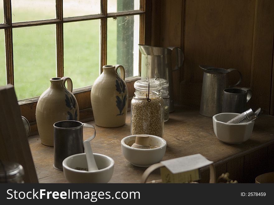 A Close Up Of Shaker Kitchen Equipment By A Window. A Close Up Of Shaker Kitchen Equipment By A Window