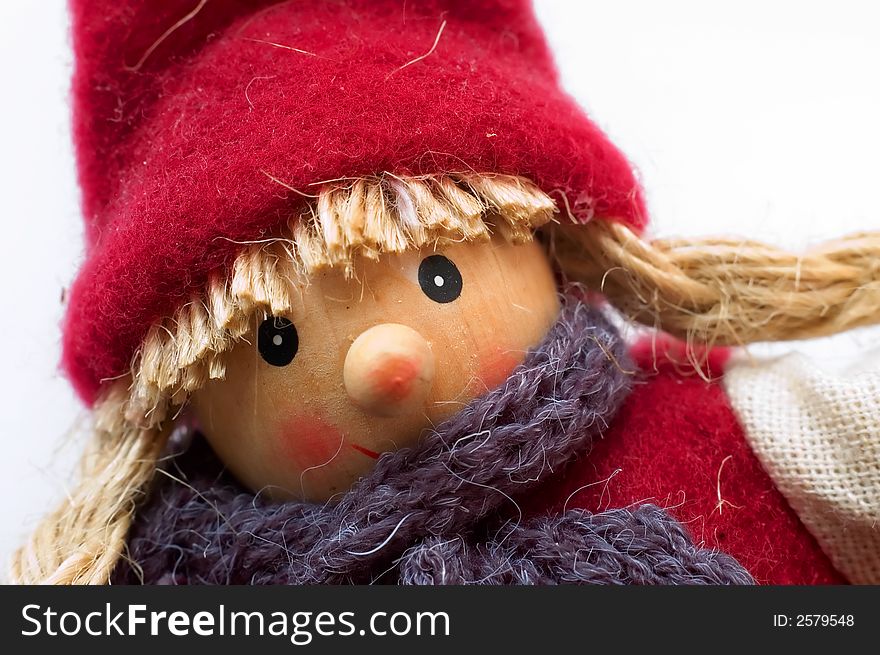 A small wooden christmas doll. A small wooden christmas doll