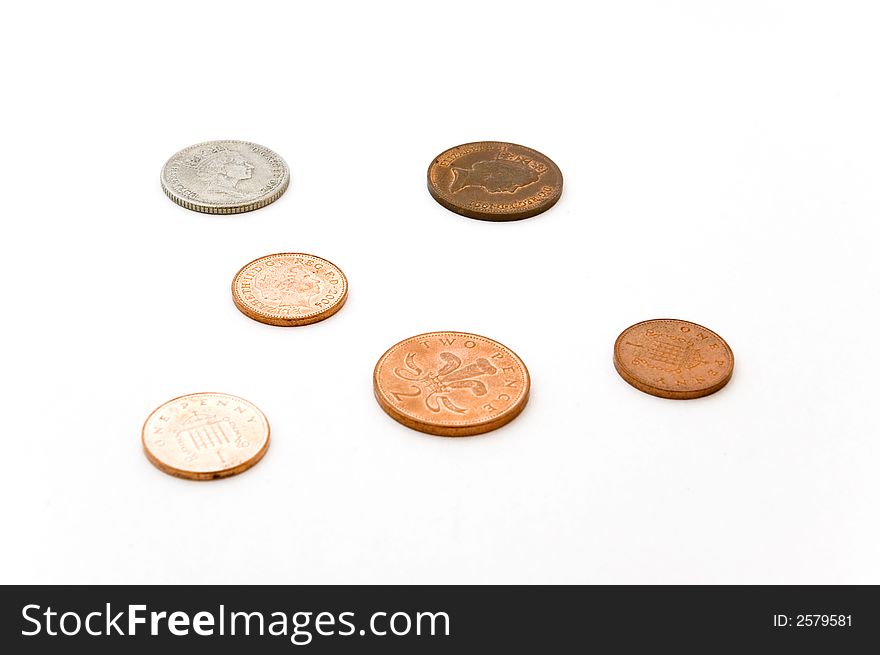 A group of different coins isolated on white