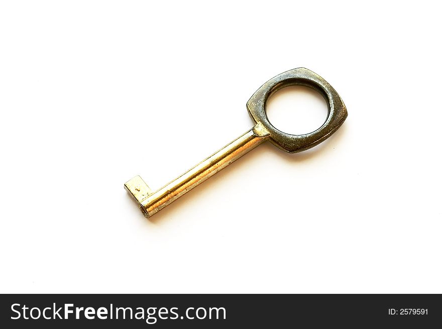 A simple golden key isolated on white