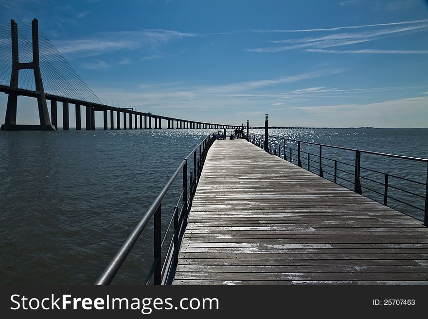 Fishermen Near The Vasco Da Gama Bridge, Lisbon