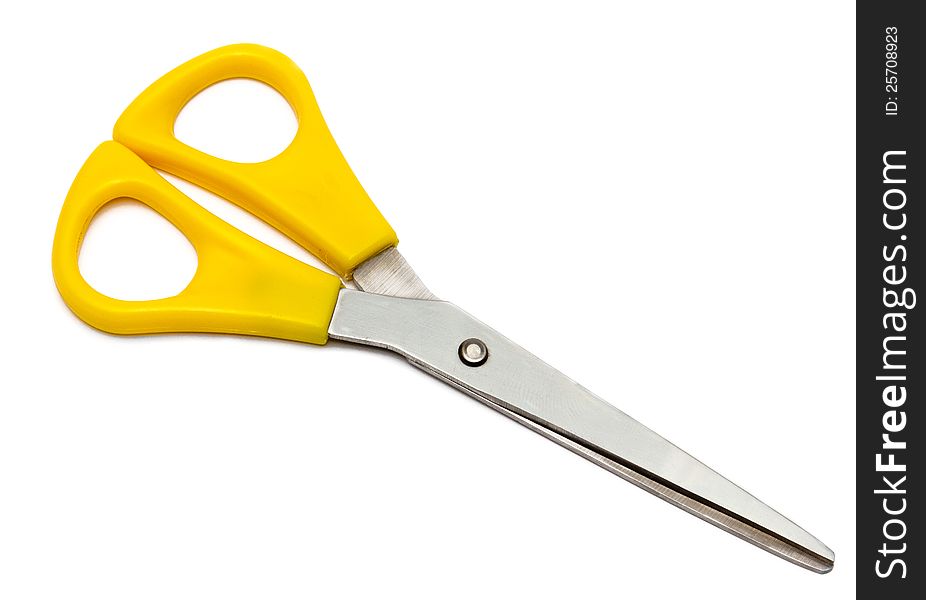 A yellow scissor isolated in white background. A yellow scissor isolated in white background