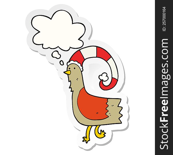 cartoon chicken in funny christmas hat and thought bubble as a printed sticker