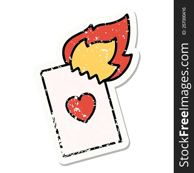 Traditional Distressed Sticker Tattoo Of A Flaming Card