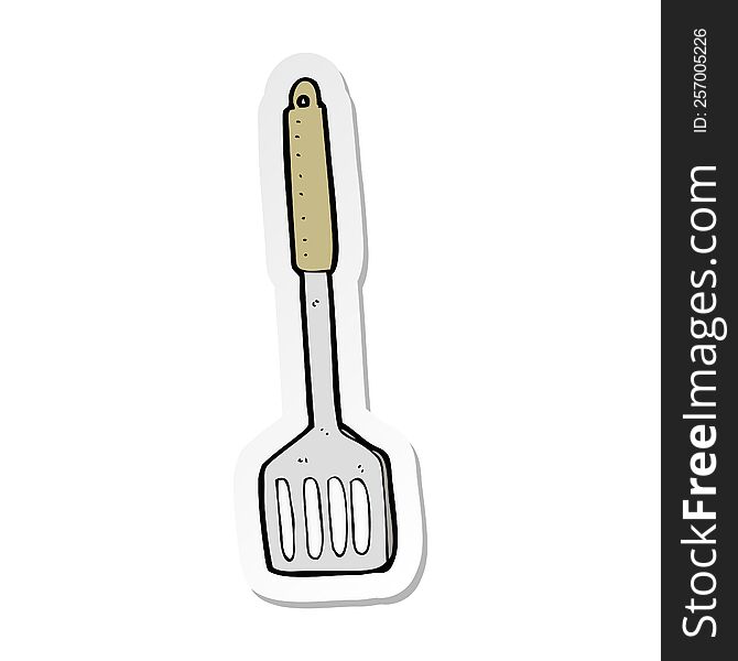 sticker of a cartoon kitchen spatula