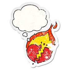 Cartoon Flaming Heart And Thought Bubble As A Distressed Worn Sticker Stock Images
