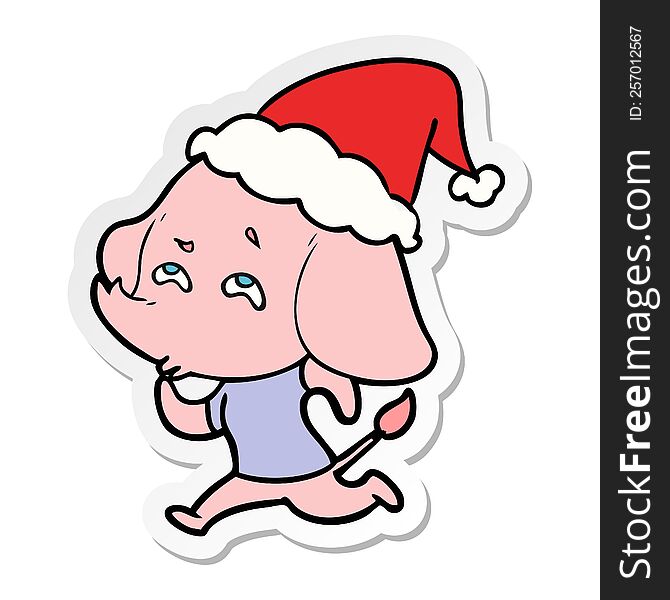 hand drawn sticker cartoon of a elephant remembering wearing santa hat