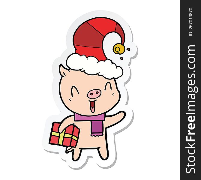 sticker of a happy cartoon pig with xmas present