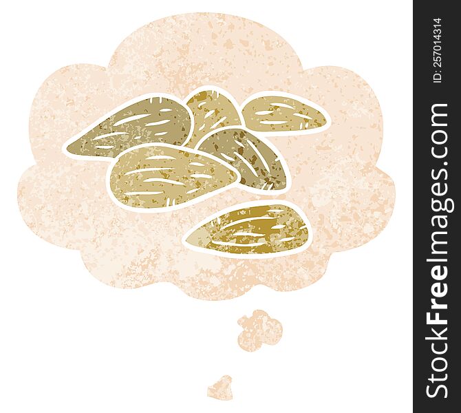 cartoon almonds with thought bubble in grunge distressed retro textured style. cartoon almonds with thought bubble in grunge distressed retro textured style