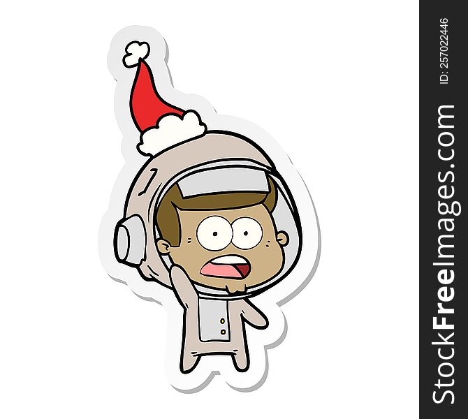 Sticker Cartoon Of A Surprised Astronaut Wearing Santa Hat