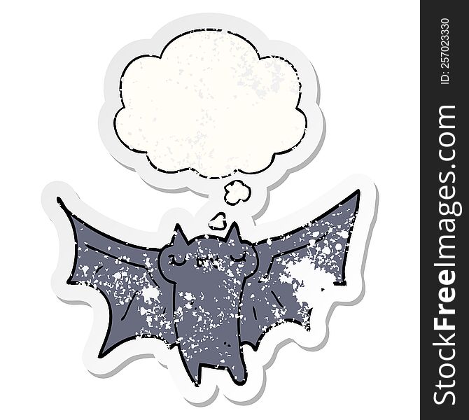 cute cartoon halloween bat and thought bubble as a distressed worn sticker