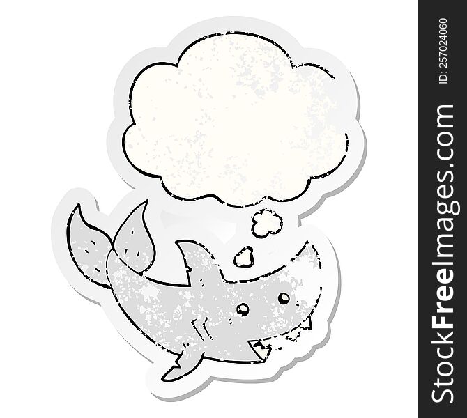 cartoon shark with thought bubble as a distressed worn sticker