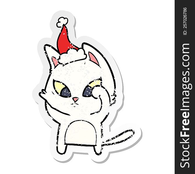 Confused Distressed Sticker Cartoon Of A Cat Wearing Santa Hat