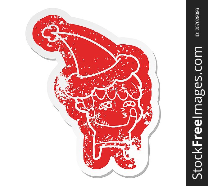 quirky cartoon distressed sticker of a curious man wearing santa hat