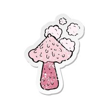 Retro Distressed Sticker Of A Cartoon Mushroom Stock Photo