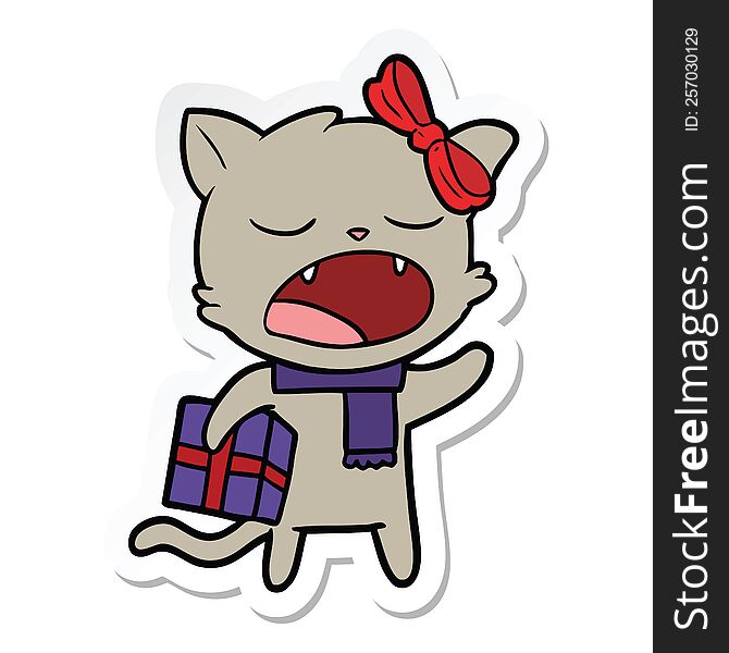 sticker of a cartoon cat with christmas present