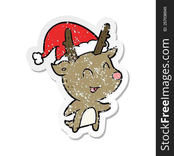 distressed sticker of a cartoon christmas reindeer