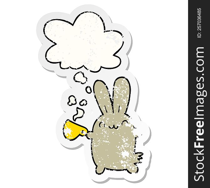 cute cartoon rabbit drinking coffee with thought bubble as a distressed worn sticker