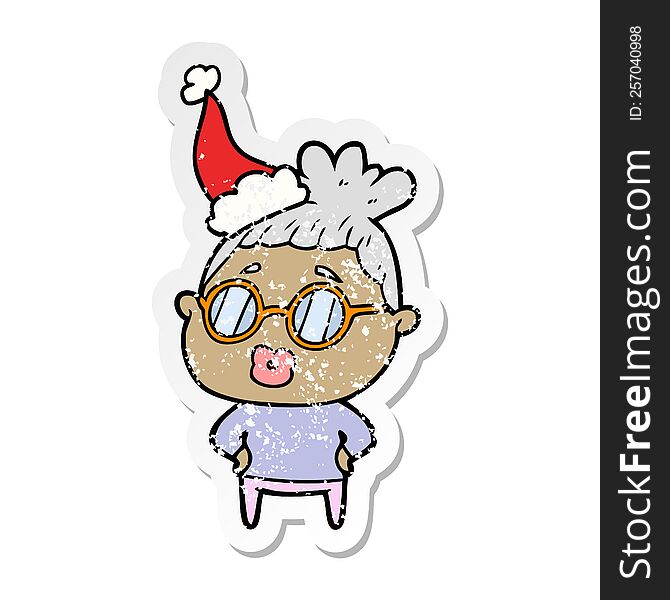 distressed sticker cartoon of a librarian woman wearing spectacles wearing santa hat