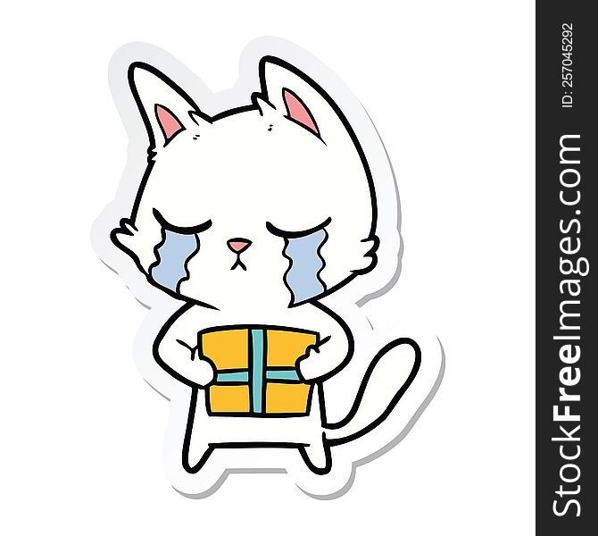 sticker of a crying cartoon cat holding christmas present
