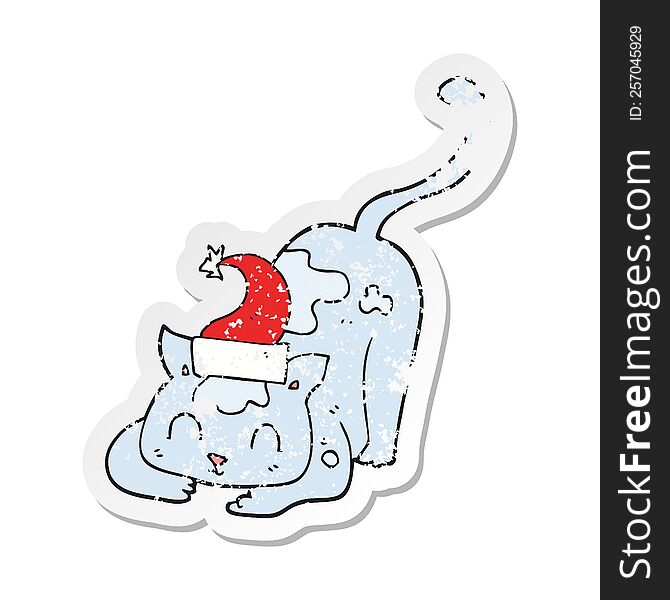 retro distressed sticker of a cartoon cat wearing christmas hat
