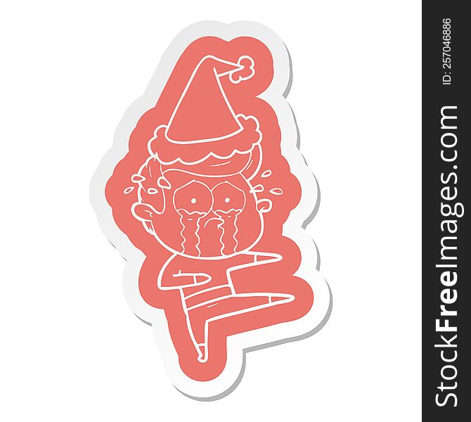 quirky cartoon  sticker of a crying dancer wearing santa hat