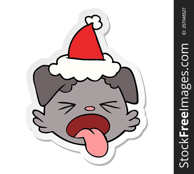 Sticker Cartoon Of A Dog Face Wearing Santa Hat