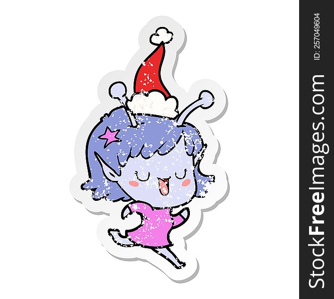 Happy Alien Girl Distressed Sticker Cartoon Of A Wearing Santa Hat