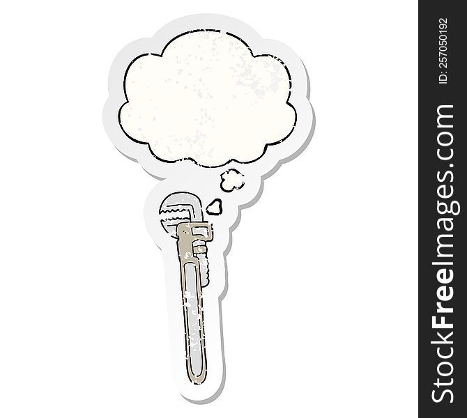 cartoon adjustable wrench with thought bubble as a distressed worn sticker