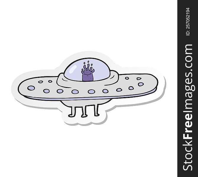 sticker of a cartoon flying saucer