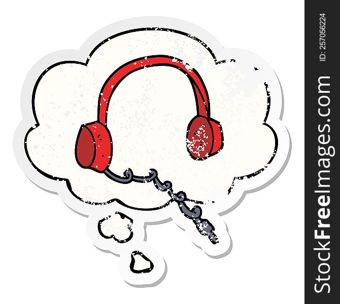 cartoon headphones with thought bubble as a distressed worn sticker