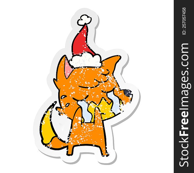 Crying Fox Distressed Sticker Cartoon Of A Wearing Santa Hat