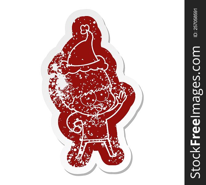happy quirky cartoon distressed sticker of a boy wearing santa hat
