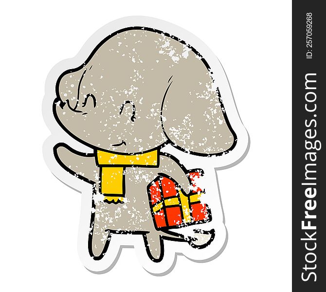 Distressed Sticker Of A Cute Cartoon Christmas Elephant