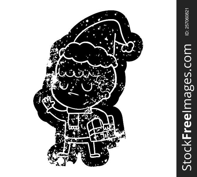 quirky cartoon distressed icon of a grumpy boy wearing santa hat
