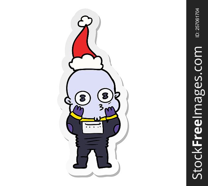 Sticker Cartoon Of A Weird Bald Spaceman Wearing Santa Hat